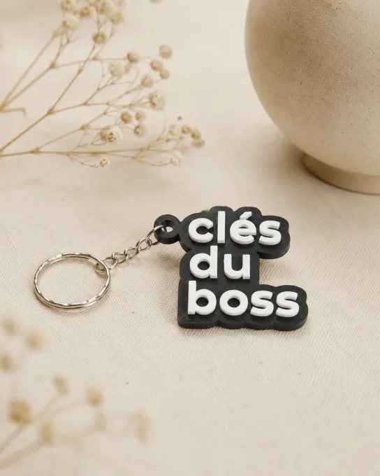 Porte-clés à message en relief imprimé en 3D en PLA+ noir et blanc