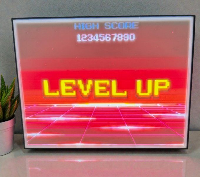 Cadre lumineux 3D “LEVEL UP” – Ambiance Gaming Rétro