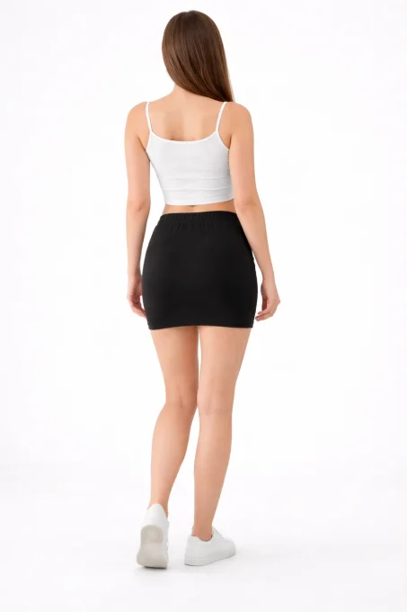Mini-jupe tube noire en jersey de coton stretch – taille M