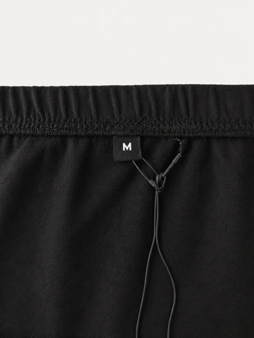 Mini-jupe tube noire en jersey de coton stretch – taille M
