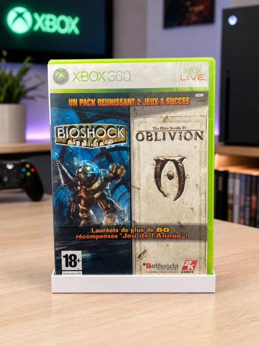 Boîte du pack double jeu Xbox 360 BioShock et The Elder Scrolls IV Oblivion sur un meuble.