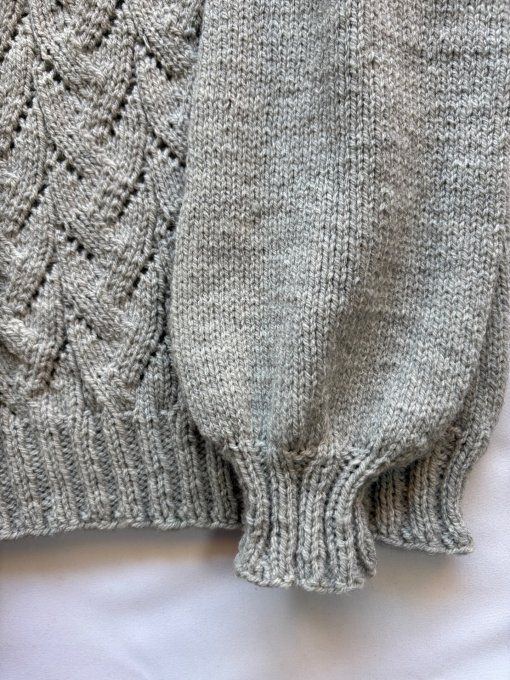 Pull col roulé gris motif torsadé, maille douce