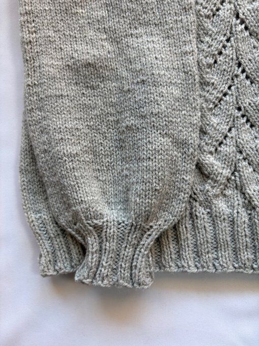 Pull col roulé gris motif torsadé, maille douce